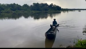 Canoe ride to distant village